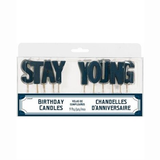 Stay Young message large birthday cake candles